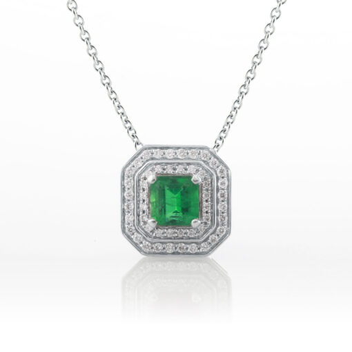 Double halo emerald pendant